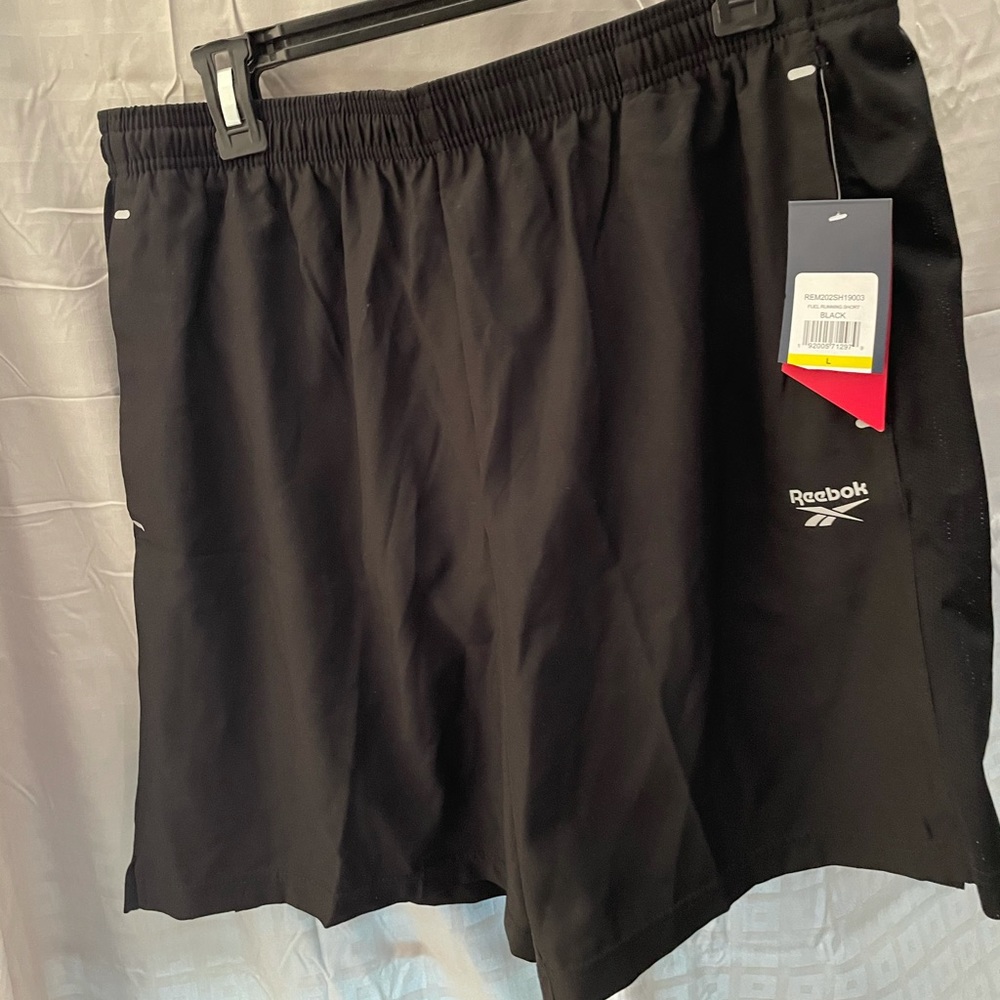 NWT Reebok swim/run short + attached inner panel